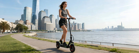iScooter i9 Max electric scooter with 10-inch honeycomb tires on city street